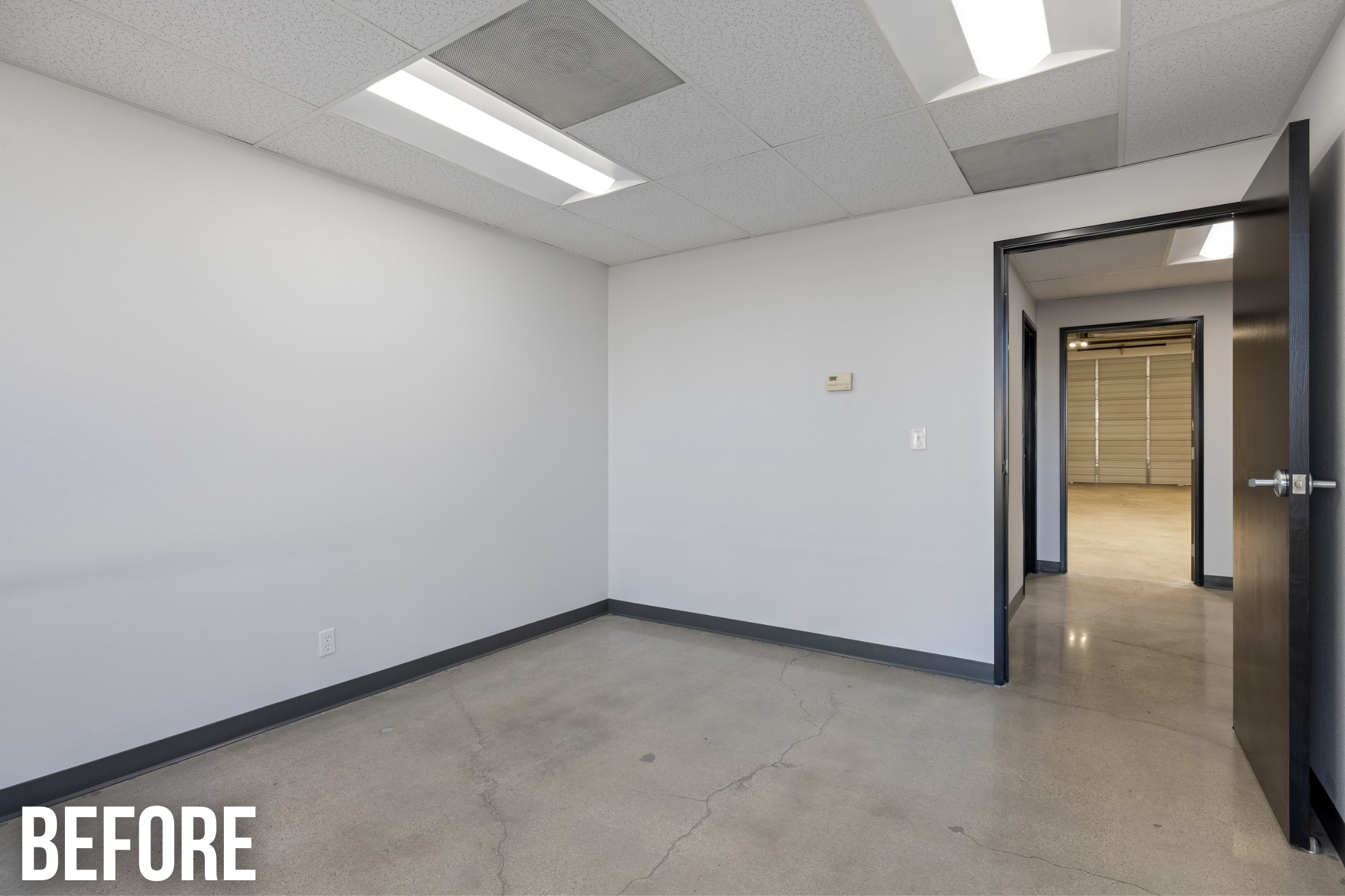 Square Foot Productions Virtual Staging - before image of a small, empty entryway of a commercial building