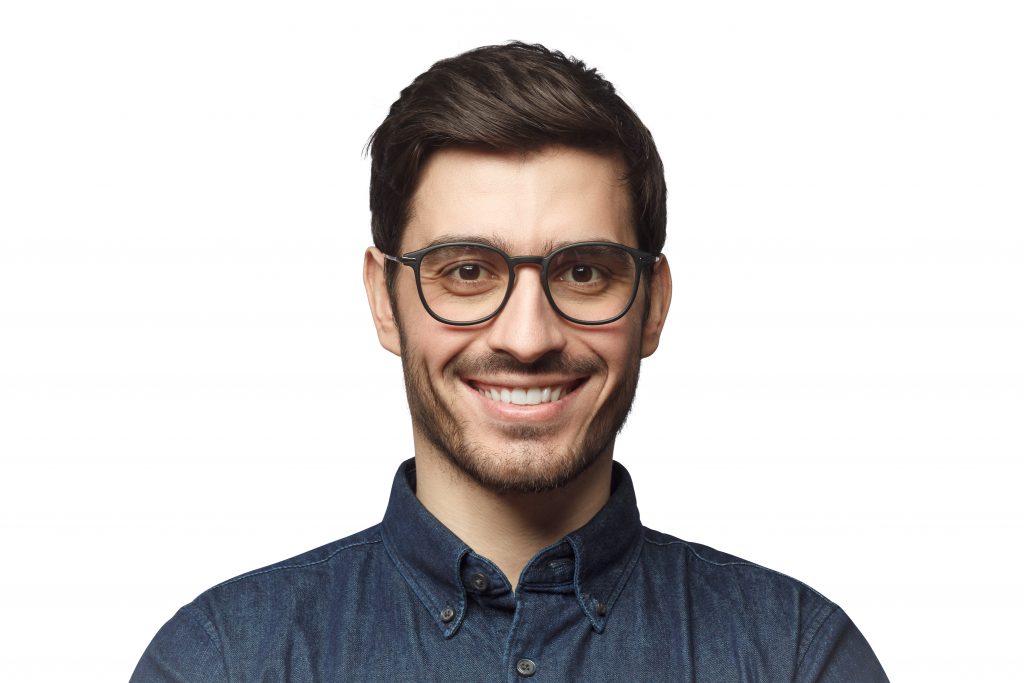Headshot of smiling business man isolated on white background