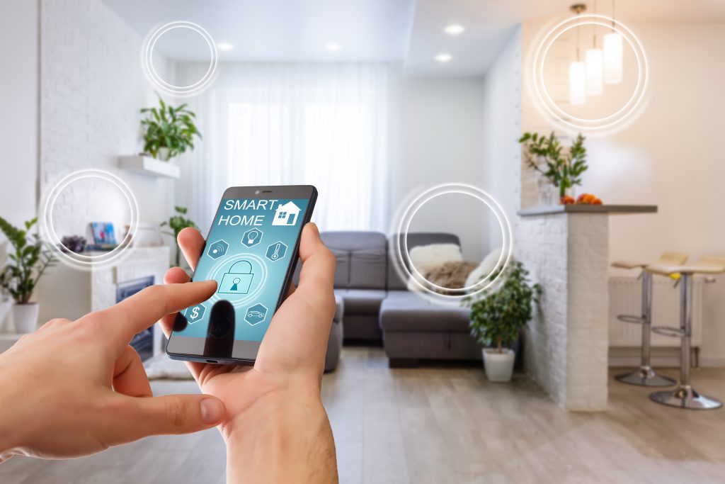 image of a person using an app to control smart home features