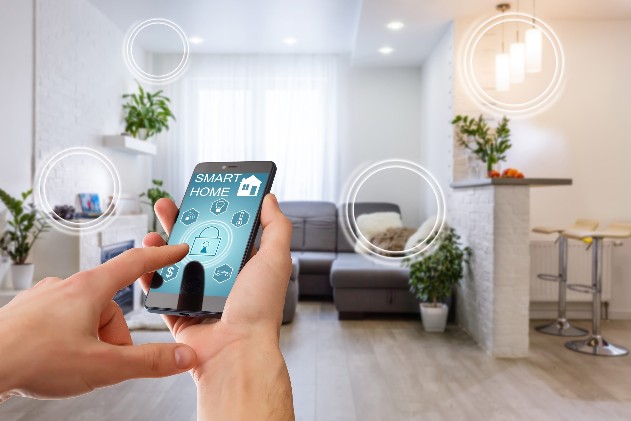 image of a person using an app to control smart home features
