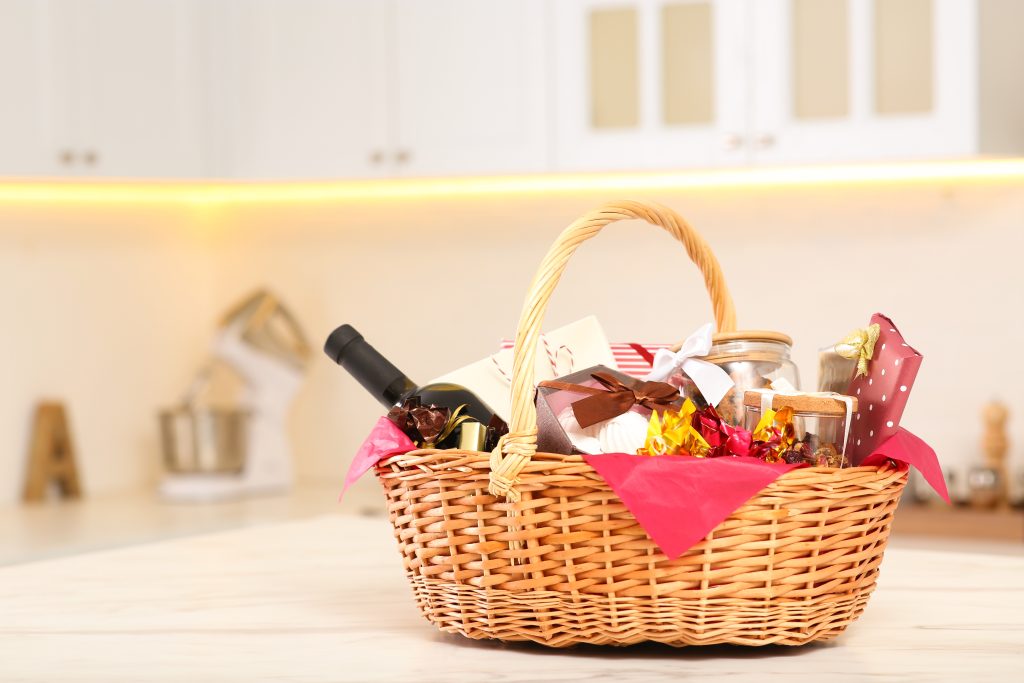 image of a gift basket as one of the must-have Airbnb items to impress guests