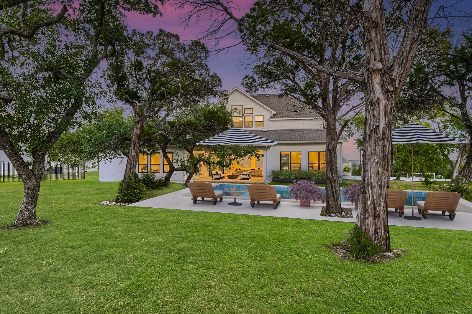 Virtual staging vs virtual remodeling; rural residential house, backyard with trees after virtual remodel adds a pool