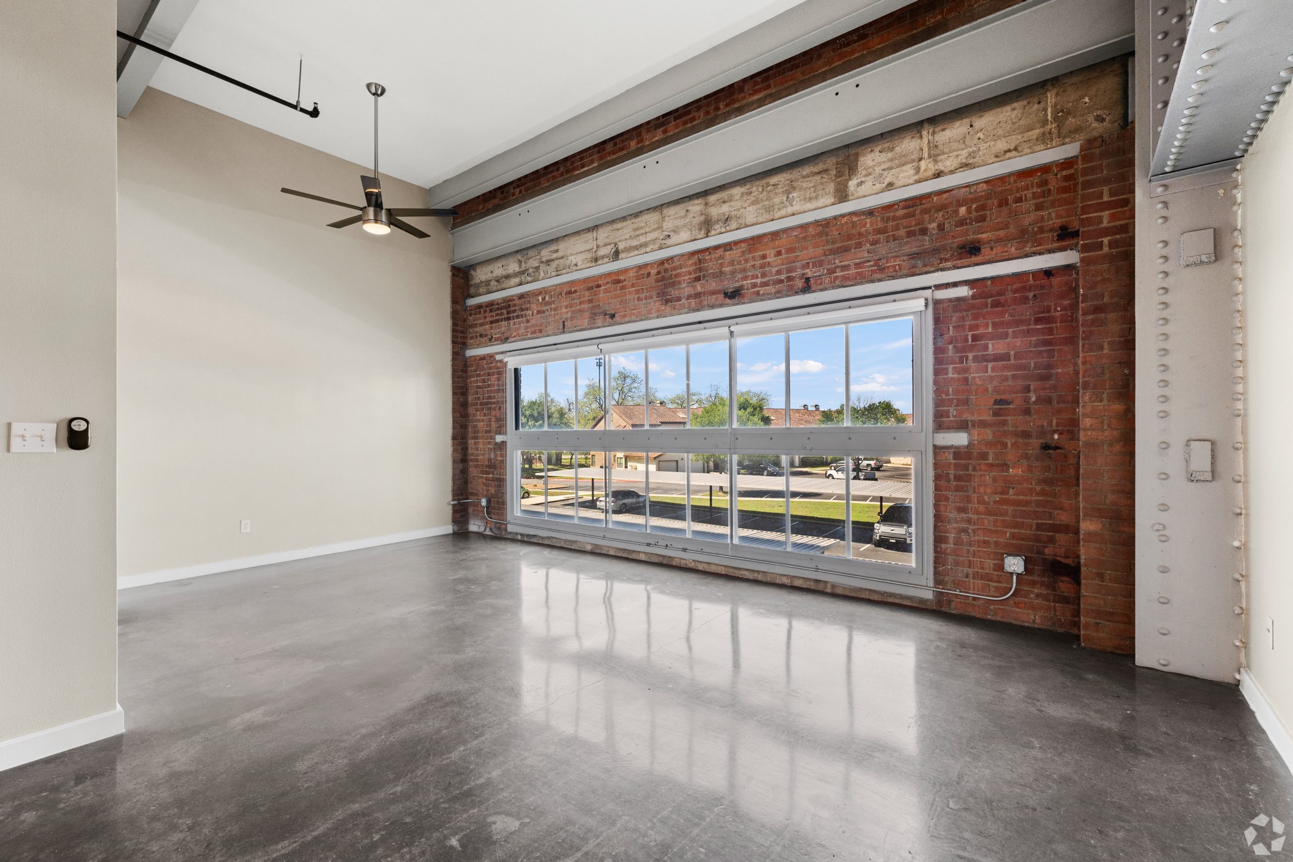 Vacant loft apartment; before virtual apartment staging