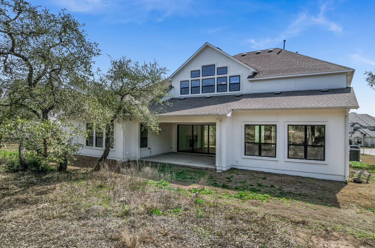 Before image; house with empty backyard