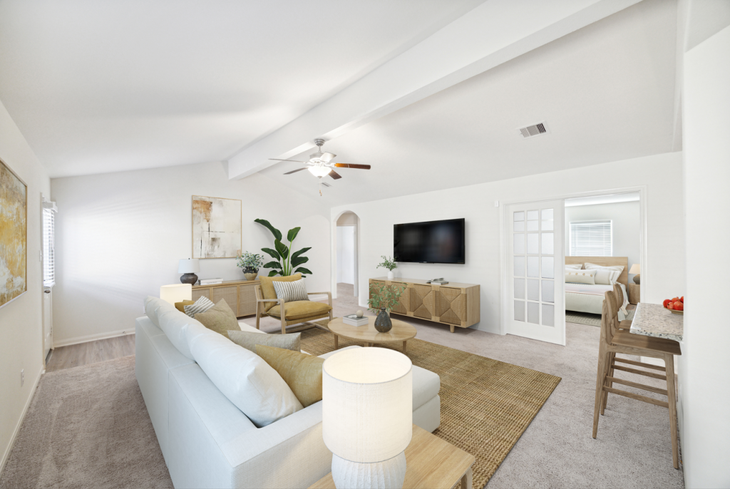 after virtual staging; beautiful living room with sectional, area rug, etc